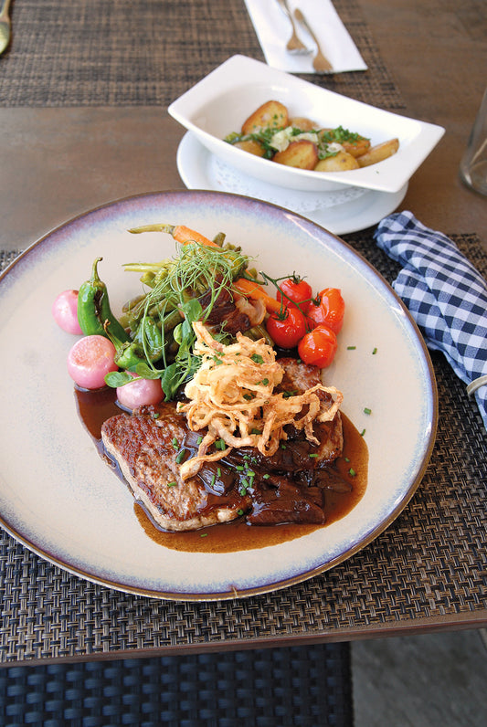 Grill- und Western-Romantik hinter dicken Holzbalken